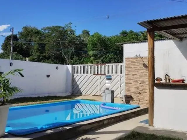 Imagem: A casa possui 2 Dormitórios, 2 Banheiros, 3 Vagas na