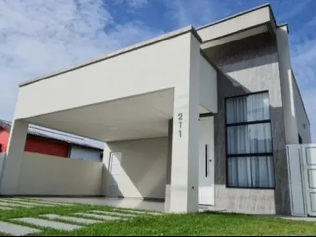 Imagem: A casa possui 3 Dormitórios, 2 Banheiros, 2 Vagas na