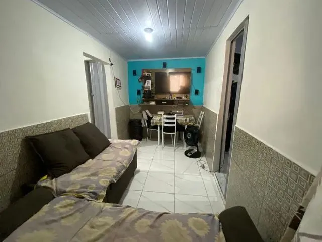 Imagem: A casa possui 2 Dormitórios, 1 Banheiro, 60m² de Área e