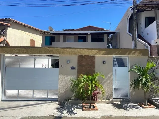 Imagem: A casa possui 2 Dormitórios, Acomodam 4 pessoas, 1 Vaga na