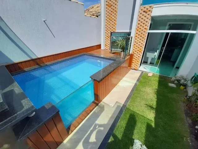 Imagem: A casa possui 3 Dormitórios, 4 Banheiros, 2 Vagas na
