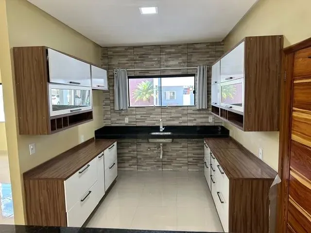 Imagem: A casa em condomínio possui 3 Dormitórios, 3 Suítes, 4