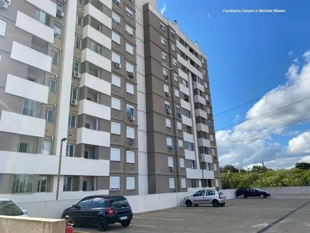 Imagem: O apartamento possui 2 Dormitórios, 1 Suíte, 2 Banheiros,