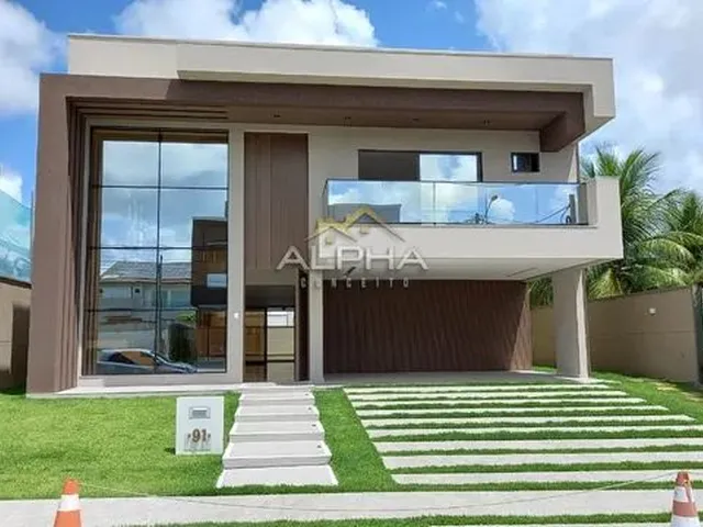 Imagem: A casa em condomínio possui 5 Dormitórios, 5 Suítes, 4