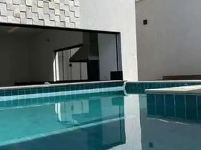Imagem 5: Imponente Sobrado com 3 Suítes Plenas, Ampla Sala e Uma Bela Piscina Elevada
