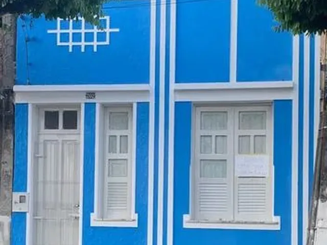Imagem: A casa possui 3 Dormitórios, 2 Banheiros e está