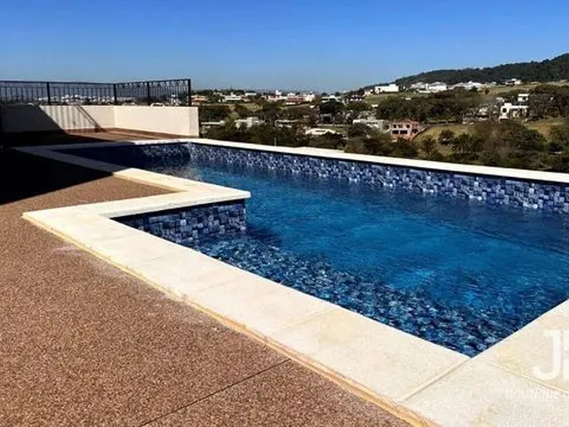 Imagem: A casa em condomínio possui 5 Dormitórios, 5 Banheiros, 5
