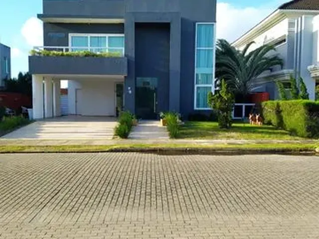 Imagem: A casa em condomínio possui 4 Dormitórios, 4 Suítes, 2