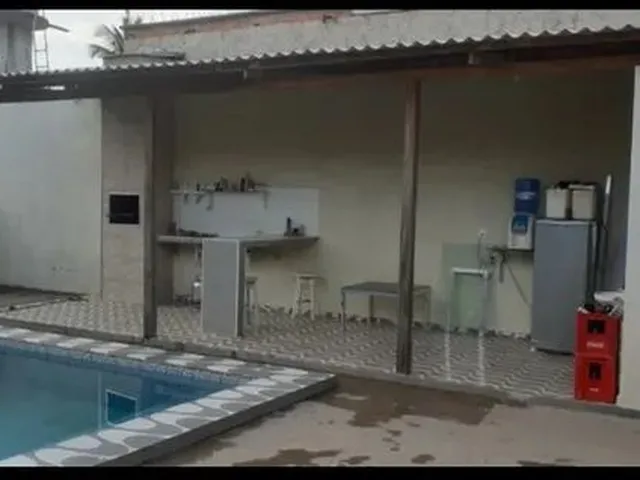 Imagem: A casa possui 3 Dormitórios, 5 Banheiros, 2 Vagas na
