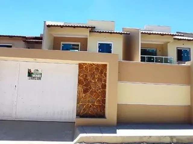 Imagem: A casa possui 3 Dormitórios, 2 Banheiros, 1 Vaga na