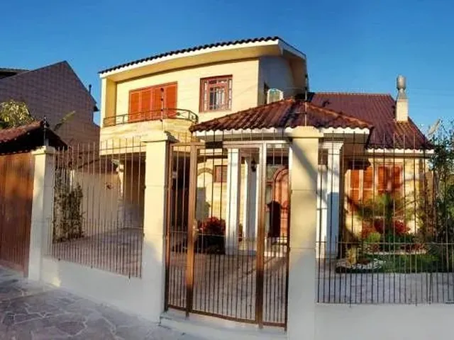 Imagem: A casa possui 3 Dormitórios, 1 Suíte, 2 Banheiros, 106m²