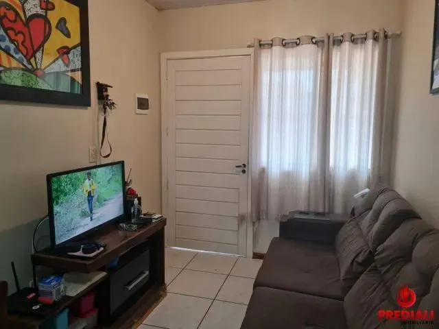 Imagem: A casa possui 2 Dormitórios, 1 Banheiro, 1 Vaga na