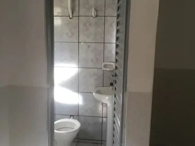 Imagem 4: Suíte com Cozinha Integrada e Área de Serviço (Kitnet