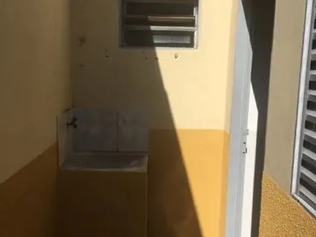 Imagem 5: Suíte com Cozinha Integrada e Área de Serviço (Kitnet