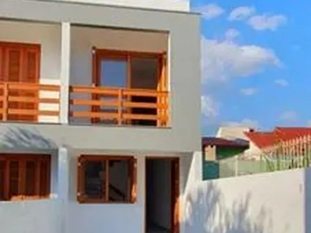 Imagem: A casa possui 2 Dormitórios, 2 Banheiros, 2 Vagas na
