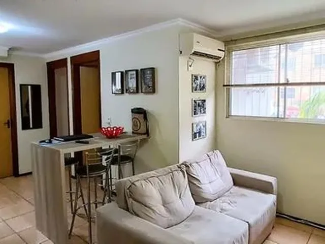 Imagem: O apartamento possui 2 Dormitórios, 1 Banheiro, 1 Vaga na