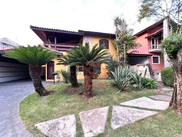 Imagem: A casa em condomínio possui 5 Dormitórios, 5 Suítes, 5