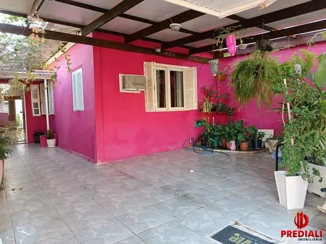 Imagem: A casa possui 2 Dormitórios, 2 Banheiros, 2 Vagas na