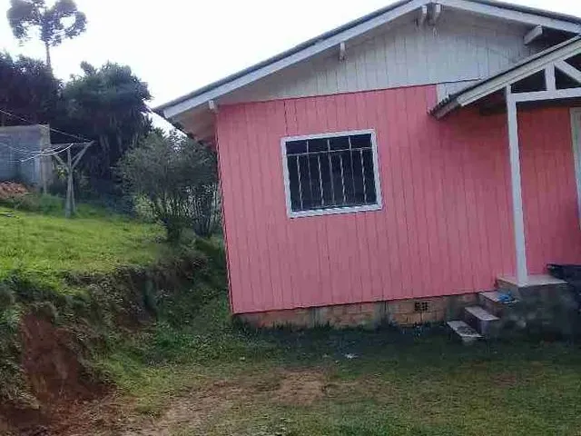 Imagem: A casa possui 2 Dormitórios, 1 Banheiro e está localizado