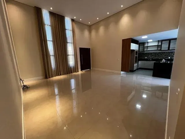 Imagem: A casa em condomínio possui 3 Dormitórios, 3 Suítes, 4