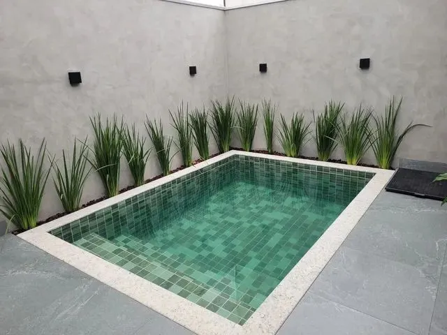 Imagem 8: Casa com Três Suítes e Piscina