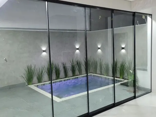 Imagem 11: Casa com Três Suítes e Piscina