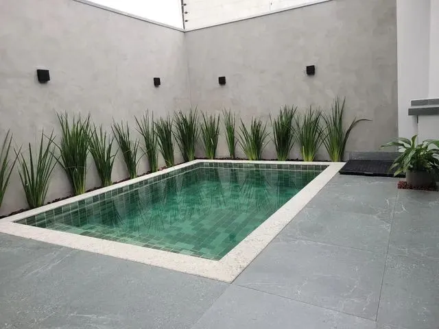 Imagem 16: Casa com Três Suítes e Piscina
