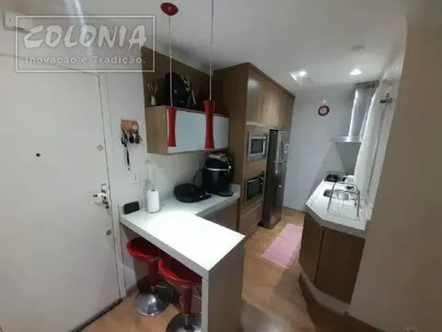Imagem: O apartamento possui 2 Dormitórios, 1 Suíte, 2 Banheiros,