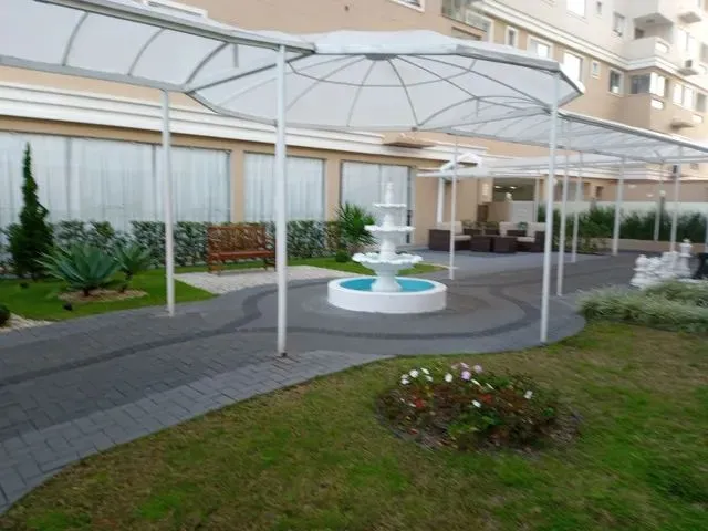 Imagem: O apartamento possui 2 Dormitórios, 1 Suíte, 2 Banheiros,