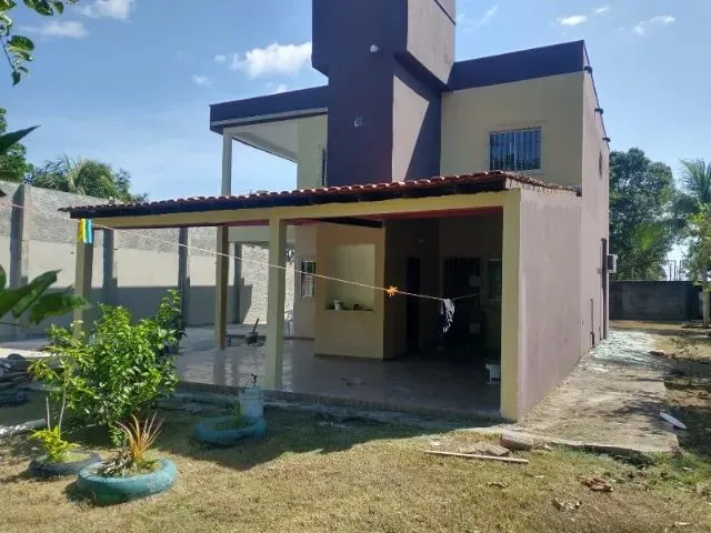 Imagem: A casa possui 4 Dormitórios, 5 Vagas na garagem, 1.400m²