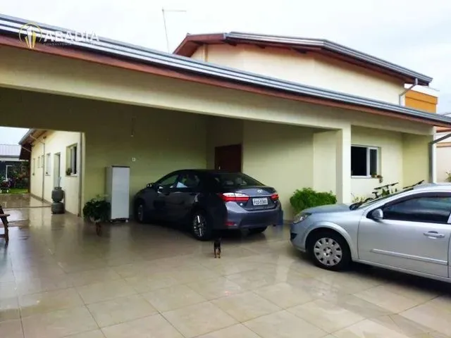 Imagem: A casa possui 4 Dormitórios, 3 Suítes, 4 Banheiros, 5