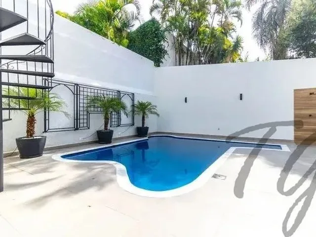 Imagem: A casa em condomínio possui 5 Dormitórios, 4 Suítes, 5