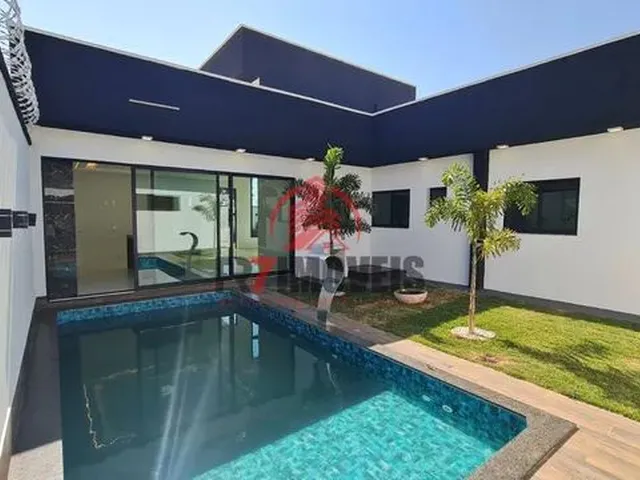 Imagem: A casa possui 3 Dormitórios, 3 Suítes, 2 Banheiros, 4