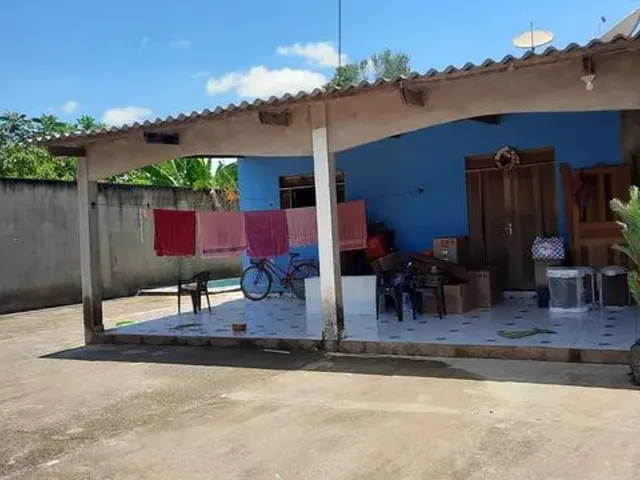 Imagem: A casa possui 2 Dormitórios, 1 Suíte, 2 Banheiros, 3