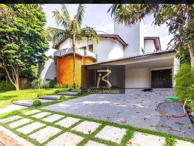 Imagem: A casa em condomínio possui 4 Dormitórios, 4 Suítes, 5