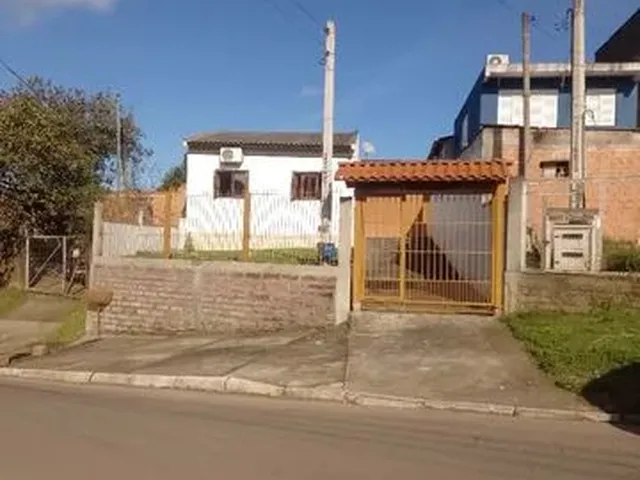 Imagem: Casa no Bairro Aparecida,Murada com Churrasqueira