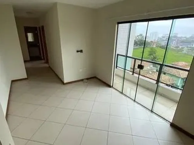 Imagem: O apartamento possui 2 Dormitórios, 1 Suíte, 2 Banheiros,