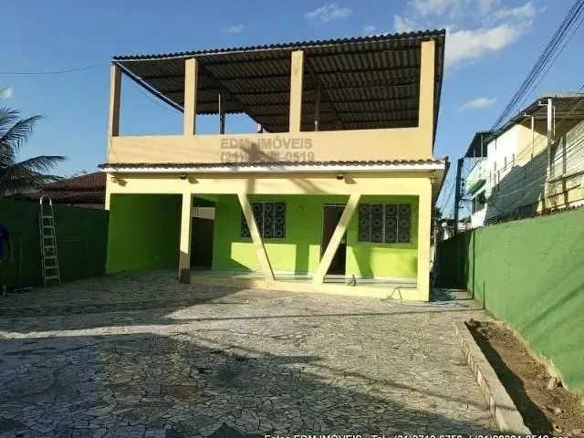 Imagem: A casa possui 2 Dormitórios, 1 Banheiro, 5 Vagas na