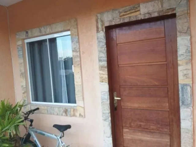 Imagem 1: Apartamento com Sala, 2 Quartos, Cozinha, Área de Serviço, 1 Banheiro e Garagem