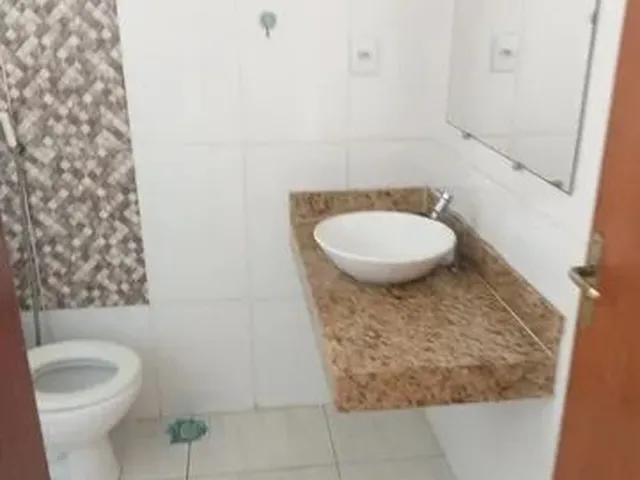 Imagem 6: Apartamento com Sala, 2 Quartos, Cozinha, Área de Serviço, 1 Banheiro e Garagem