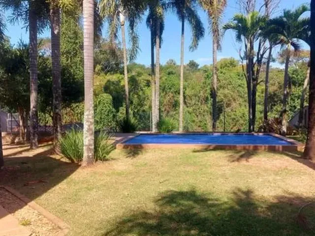 Imagem: A casa em condomínio possui 5 Dormitórios, 4 Suítes, 5