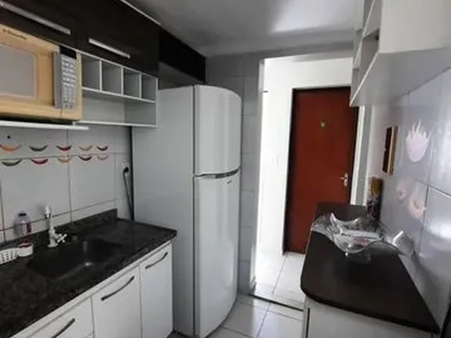 Imagem: O apartamento possui 2 Dormitórios, 1 Suíte, 2 Banheiros,