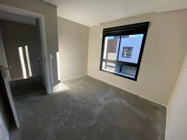 Imagem: A casa possui 3 Dormitórios, 2 Suítes, 3 Banheiros, 2