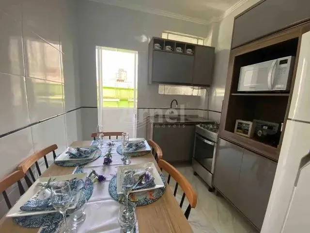 Imagem: O apartamento possui 2 Dormitórios, 1 Banheiro, 52m² de