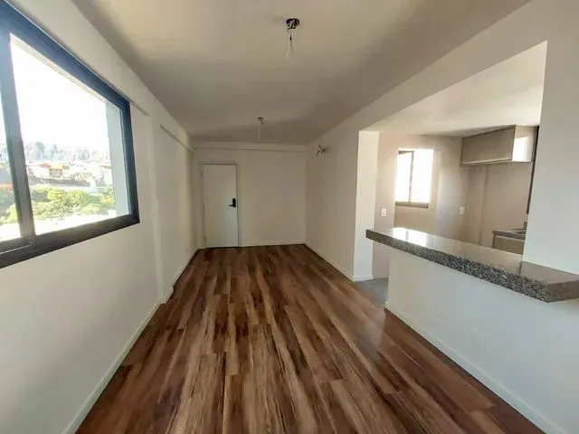 Imagem: O apartamento possui 2 Dormitórios, 1 Suíte, 2 Banheiros,