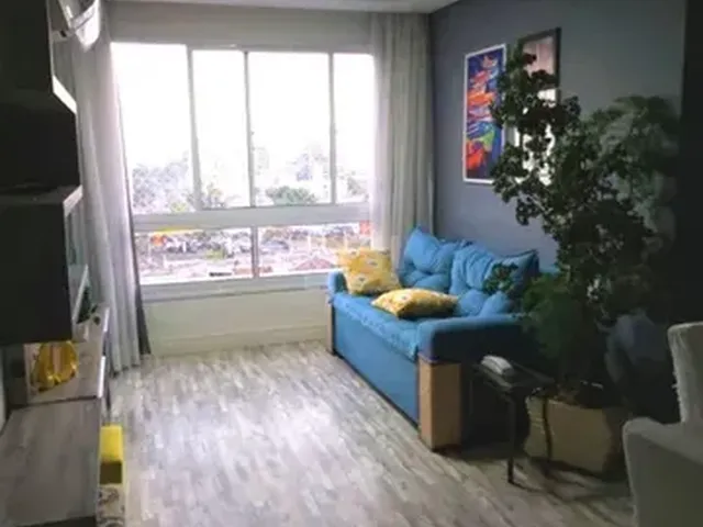 Imagem: O apartamento possui 3 Dormitórios, 1 Suíte, 2 Banheiros,