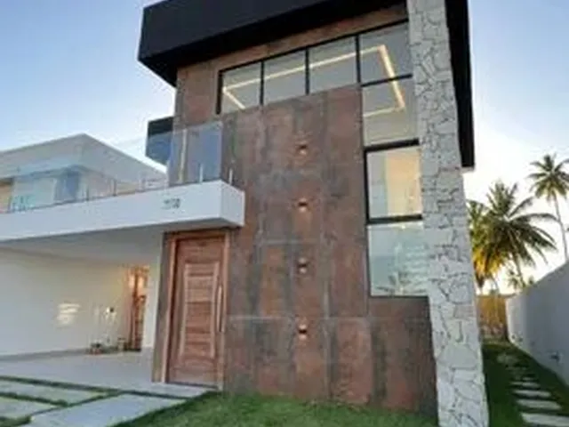 Imagem: A casa possui 3 Dormitórios, 3 Banheiros, 4 Vagas na