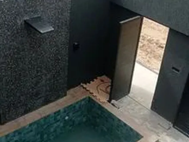 Imagem: A casa possui 5 Dormitórios, 5 Banheiros, 2 Vagas na