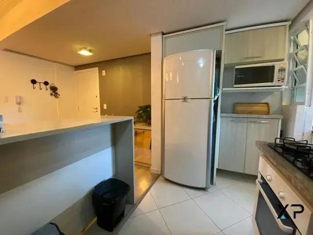 Imagem 2: Apartamento no Passa Vinte com 2 Quartos Sendo 1 Suíte, 2 Banheiros e 1 Vaga de Garagem