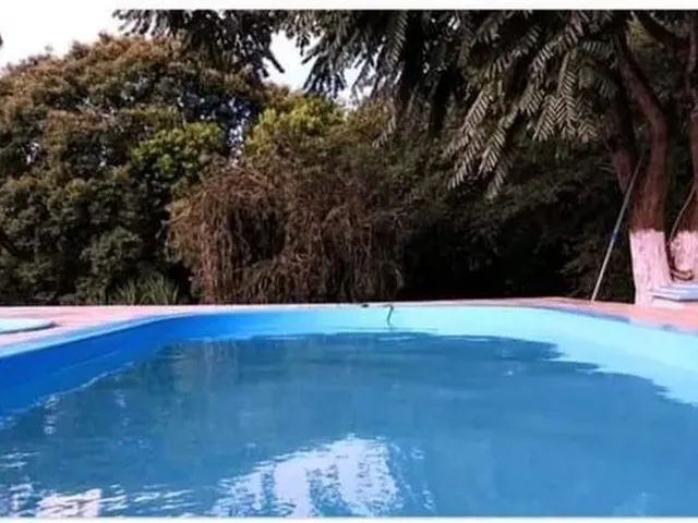Imagem: A casa possui 4 Dormitórios, 5 Banheiros, 4 Vagas na